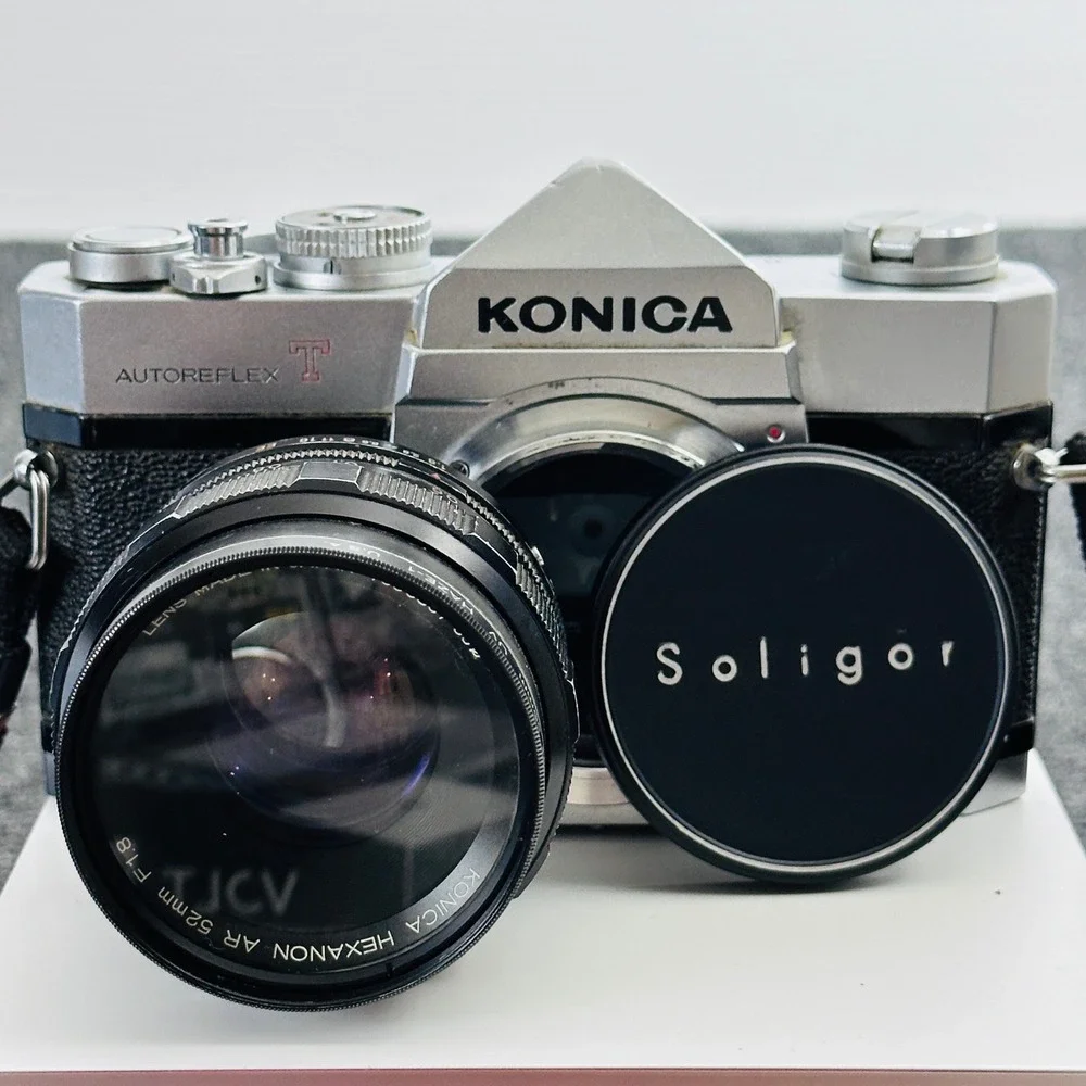 Konica Autoreflex T 35mm SLR Film Camera with Soligor Lens Silver Black UNTESTED